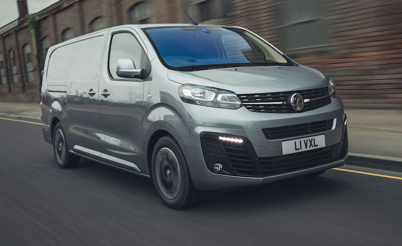 Vauxhall Vivaro e electric van exterior front driving in city